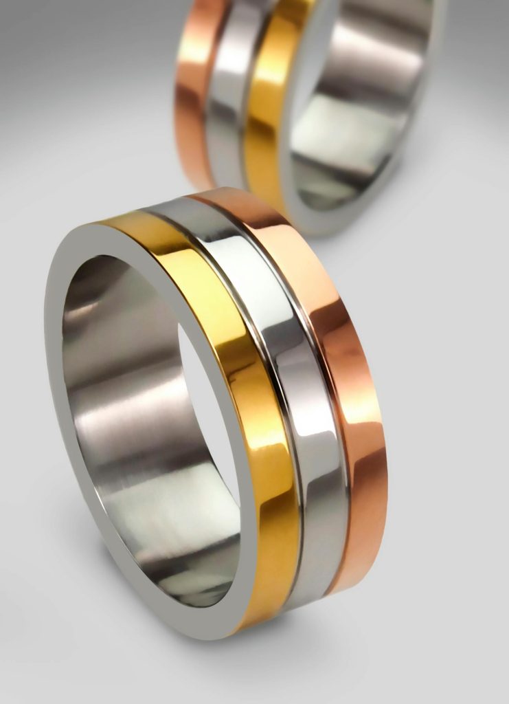 pexels-photo-204427-204427 Elegant tri-color gold rings showcasing modern design, perfect for engagements or weddings.
